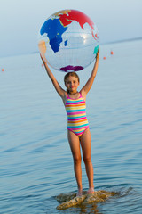 Wall Mural - Summer  -  girl playing in the sea, summer travel concept