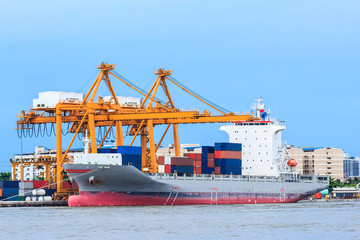 crane working with container cargo in shipyard