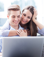 Wall Mural - Young people using laptop