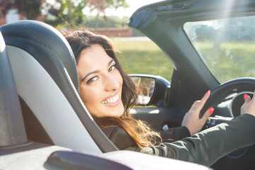 Business woman in sports car