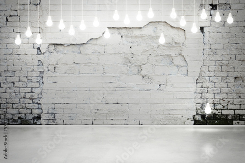 Obraz w ramie damaged brick wall with bulbs