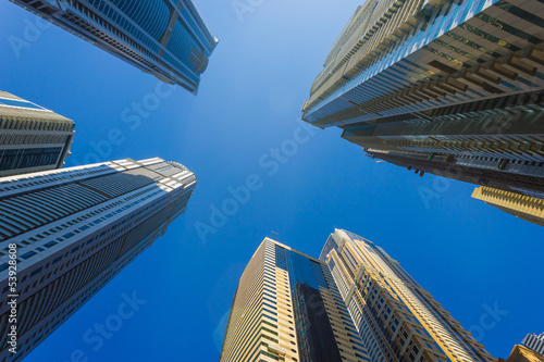 Fototapeta na wymiar High rise buildings and streets in Dubai, UAE