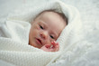 © eleonora_os - newborn with Down syndrome is quiet and looks
