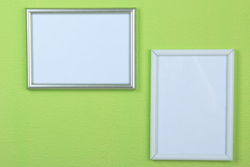 Photo frames on wall background