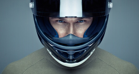 Fotobehang - handsome man in helmet on blue background