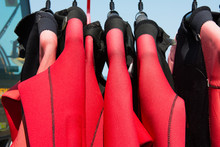 Red Rubber Wet Suits