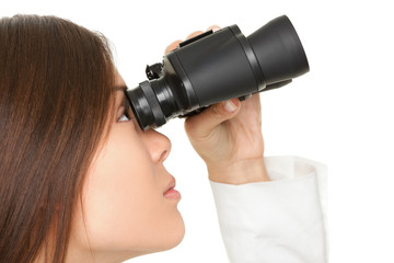 Wall Mural - Young Businesswoman Looking Through Binoculars