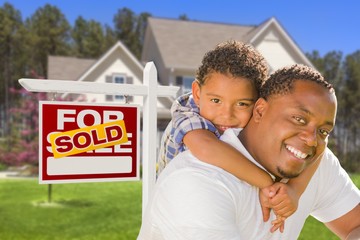 Wall Mural - Mixed Race Father and Son In Front of Real Estate Sign and House