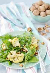 Sticker - cauliflower and ruccola salad