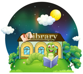 Aufkleber - A worm reading a book in front of the library
