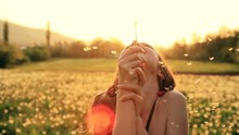Beautiful Young Woman Blowing Dandelion Laughing Summer Field