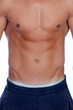 © Gelpi - Handsome shirtless young man with defined muscles