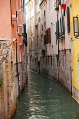 Wall Mural - View of ancient buildings and narrow canal in Venice