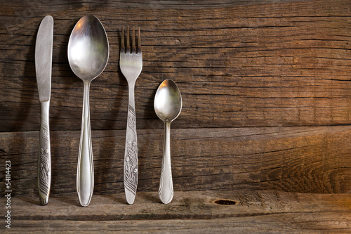 Obraz na płótnie canvas dwuczęściowy "dyptyk" Cutlery kitchenware na starym drewnianych desek tła jedzenia pojęciu