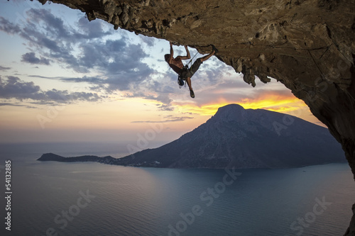 Foto-Lamellenvorhang - Male rock climber at sunset. Kalymnos Island, Greece (von Andrey Bandurenko)