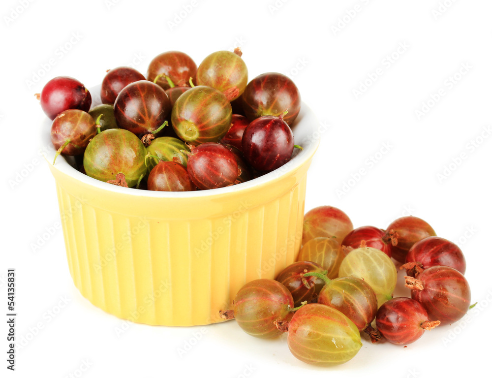 Fresh gooseberries in bowl isolated on white