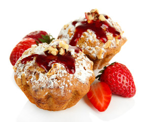 Wall Mural - Tasty muffin cakes with strawberries, isolated on white