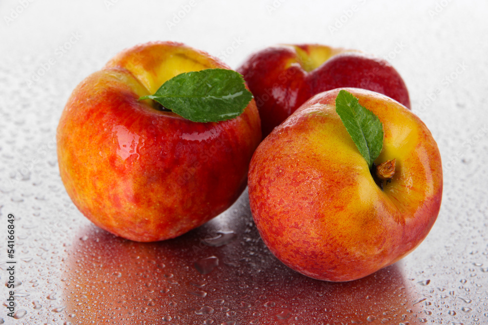 Peaches on metal background