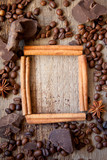 Fototapeta Desenie - frame of cinnamon sticks, coffee and chocolate
