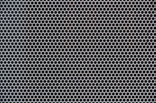 Background Of Gray Metal With Holes