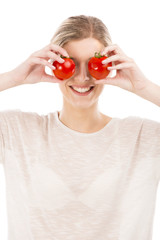 Canvas Print - Beaitiful woman with tomatos in front of the face