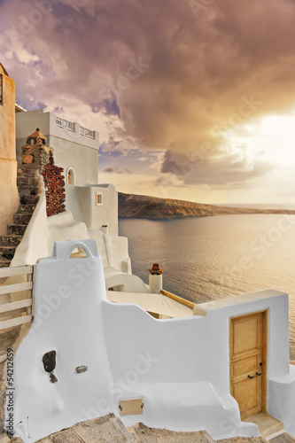 Naklejka - mata magnetyczna na lodówkę Typical villa overlooking the caldera at dusk in Oia