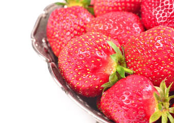 Wall Mural - strawberries in metal bowl isolated on white background