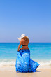 © Netfalls - Summer vacation woman on beach