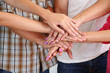 © Africa Studio - Group of young people's hands, close up