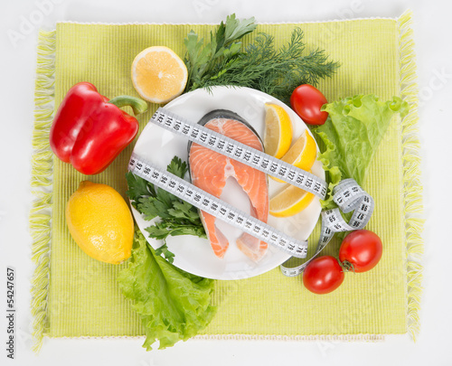 Fototapeta dla dzieci Diet weight loss concept. Fresh salmon steak