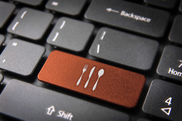 Wall Mural - Orange Cutlery keyboard key, Food background