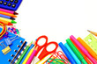 © Jenifoto - Colorful border of school supplies