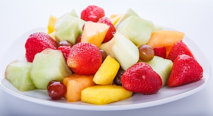 Wall Mural - White Plate of Cut Fruit