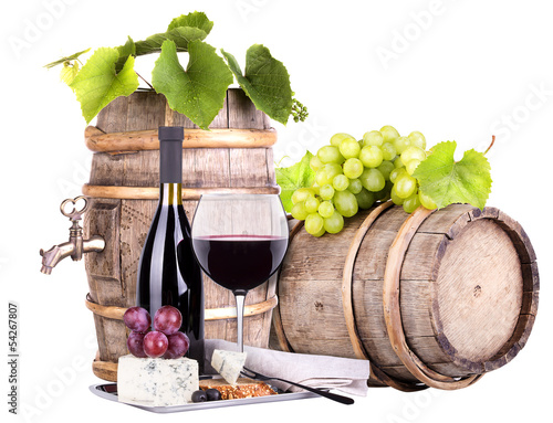Fototapeta na wymiar grapes on a barrel wine and cheese