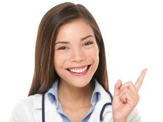 Wall Mural - Doctor pointing - or female nurse showing