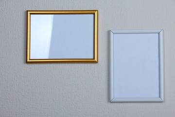 Photo frames on wall background