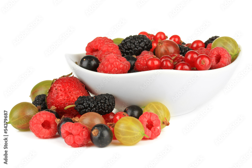 Ripe berries in bowl isolated on white