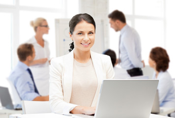 Canvas Print - businesswoman with laptop computer at work