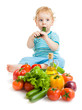 © Andrey Kuzmin - baby eating healthy food vegetables on white background