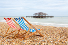 Deckchairs On Brighton Beach. Brighton, England