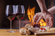 delicious wine, drinks and snacks at fireplace