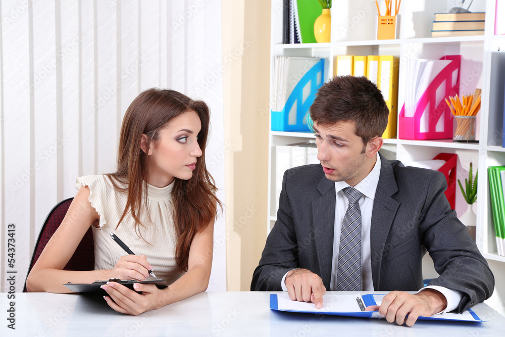 Business colleagues working together in office