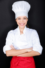 Wall Mural - Asian female chef in chef whites uniform and hat