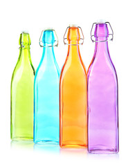 Poster - Empty color glass bottles, isolated on white