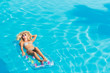 © Netfalls - woman relaxing at the swimming pool