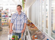 © Milles Studio - Handsome young man shopping for diary products
