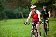 Man And Woman Riding Bicycles