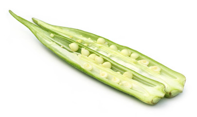 Wall Mural - Sliced okra on white background