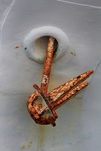Oxidized In The Bow Of A White Boat Anchor