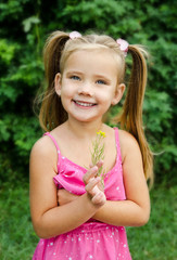 outdoor portrait of adorable smiling little girl